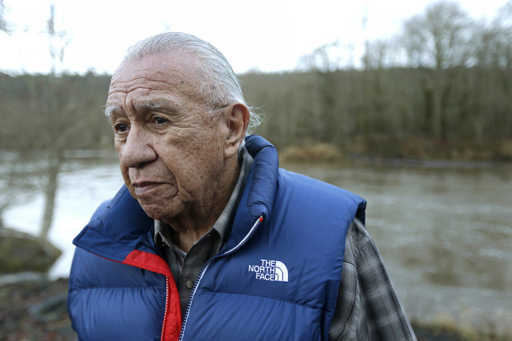 In this Jan. 13, 2014 photo, Billy Frank Jr. poses for a photo near Frank’s Landing on the Nisqually River. (AP Photo/Ted S. Warren, File)
