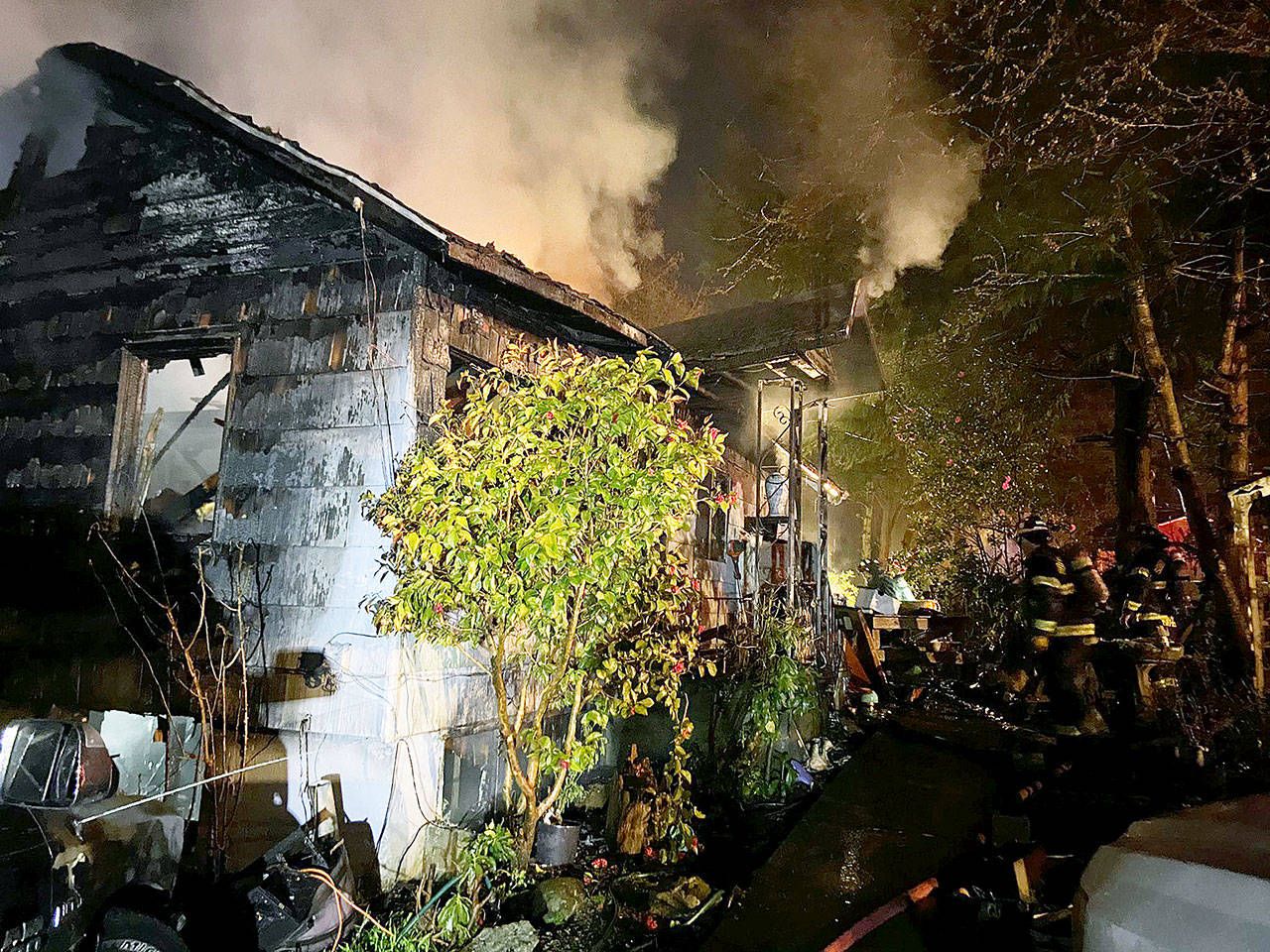 Two people, including a 7-year-old girl, died in this house fire near Mukilteo on Thursday. (South County Fire)