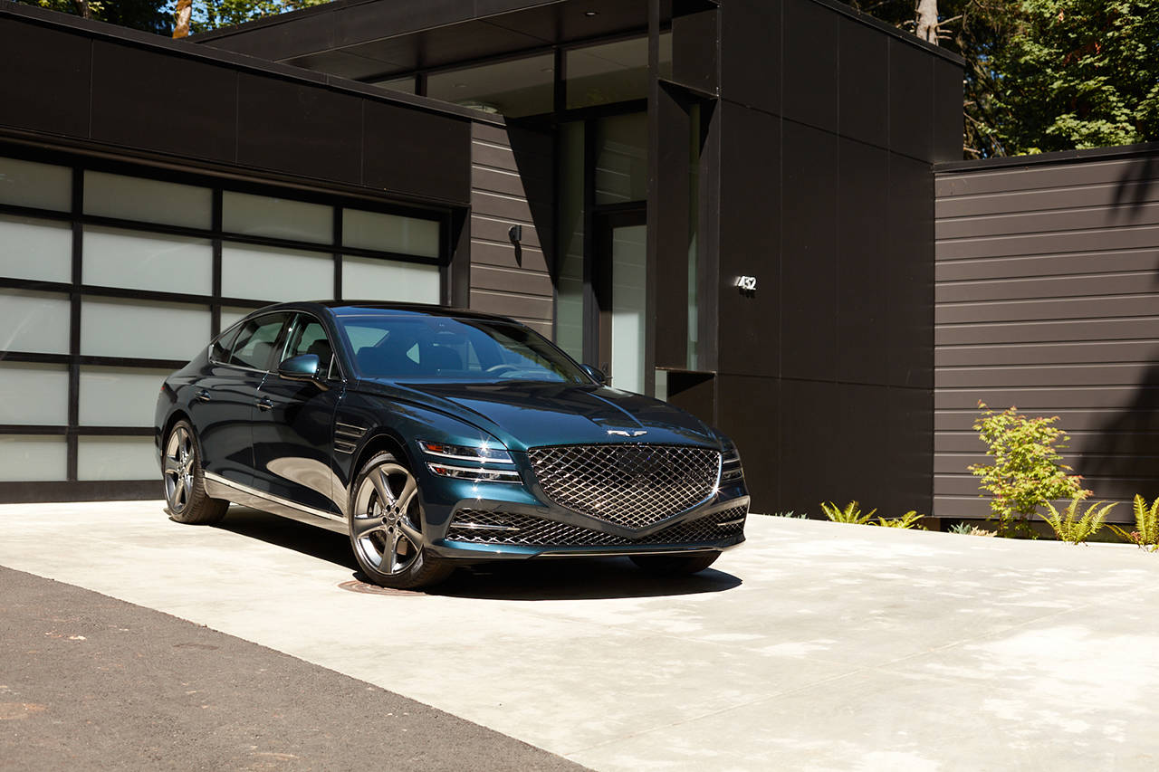 Horizontal double headlights and an enormous grille are key players in the 2021 Genesis G80 redesign. (Manufacturer photo)