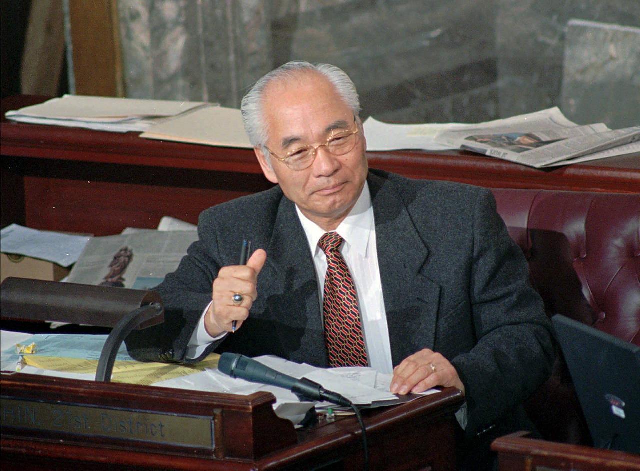 Washington state Sen. Paull Shin, D-Mukilteo, listens to debate on the Senate floor in Olympia on March 12, 1999. (AP Photo/Louie Balukoff, file)