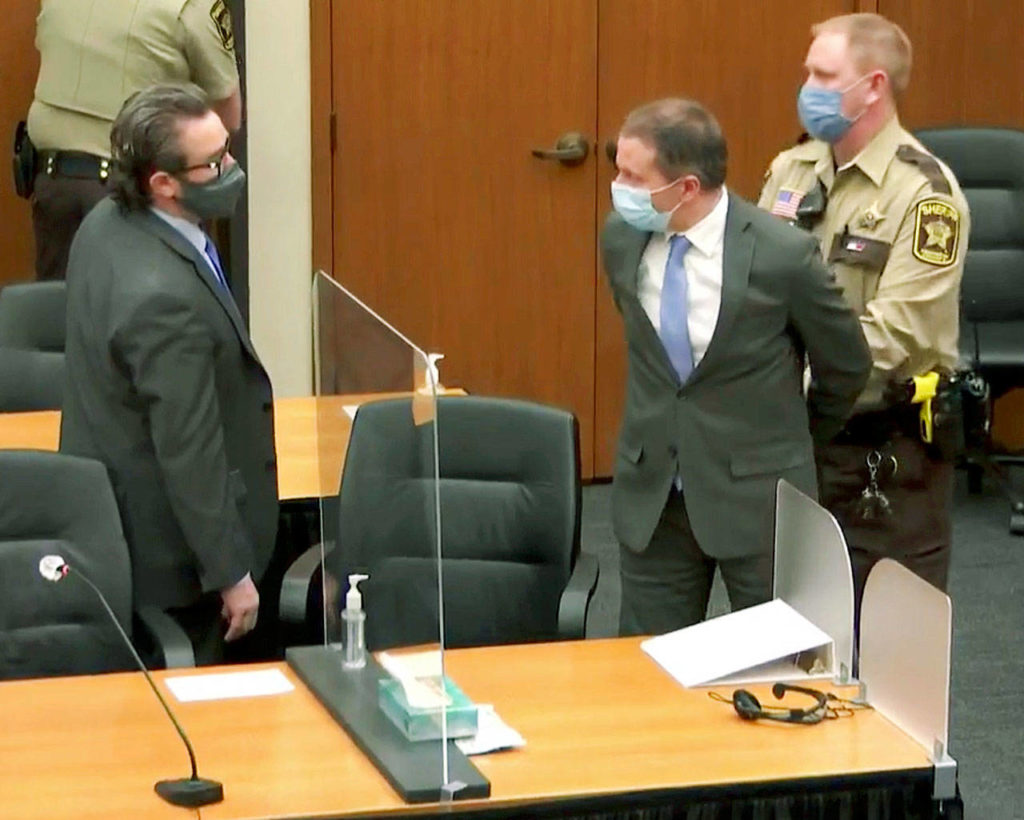 In this image from video, former Minneapolis police officer Derek Chauvin (center) is taken into custody after the verdicts were read at Chauvin’s trial for the 2020 death of George Floyd in Minneapolis. (Court TV via AP, Pool) 
