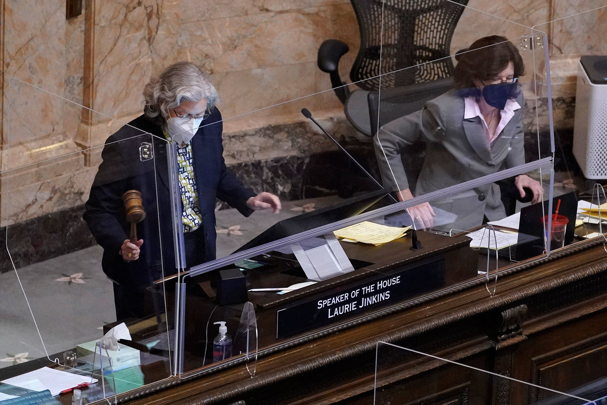 Speaker of the House Laurie Jinkins, D-Tacoma, bangs the gavel during a session of the House on Wednesday in Olympia. (AP Photo/Ted S. Warren)
