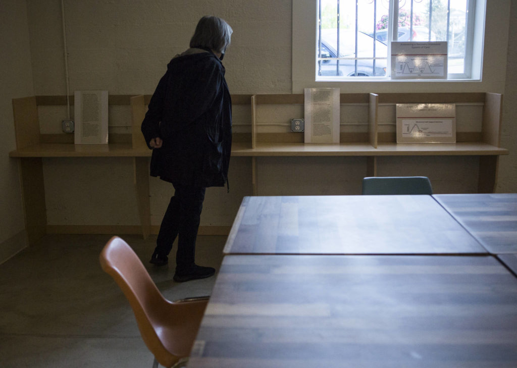Information on the recovery process is on display at the new Everett Recovery Cafe on Wednesday. (Olivia Vanni / The Herald) 
