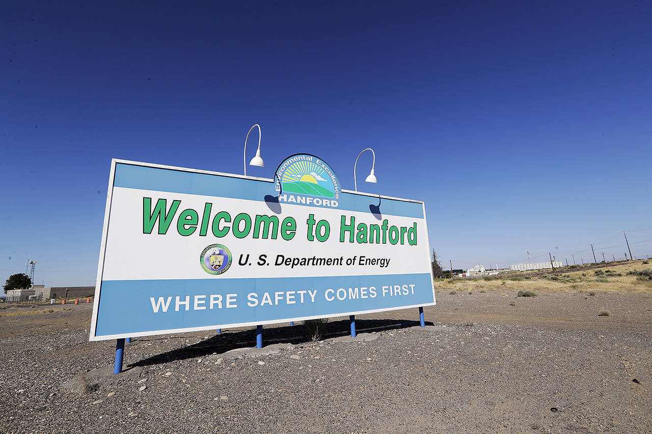 A sign at the Hanford Nuclear Reservation is posted near Richland. (AP Photo/Elaine Thompson, File)