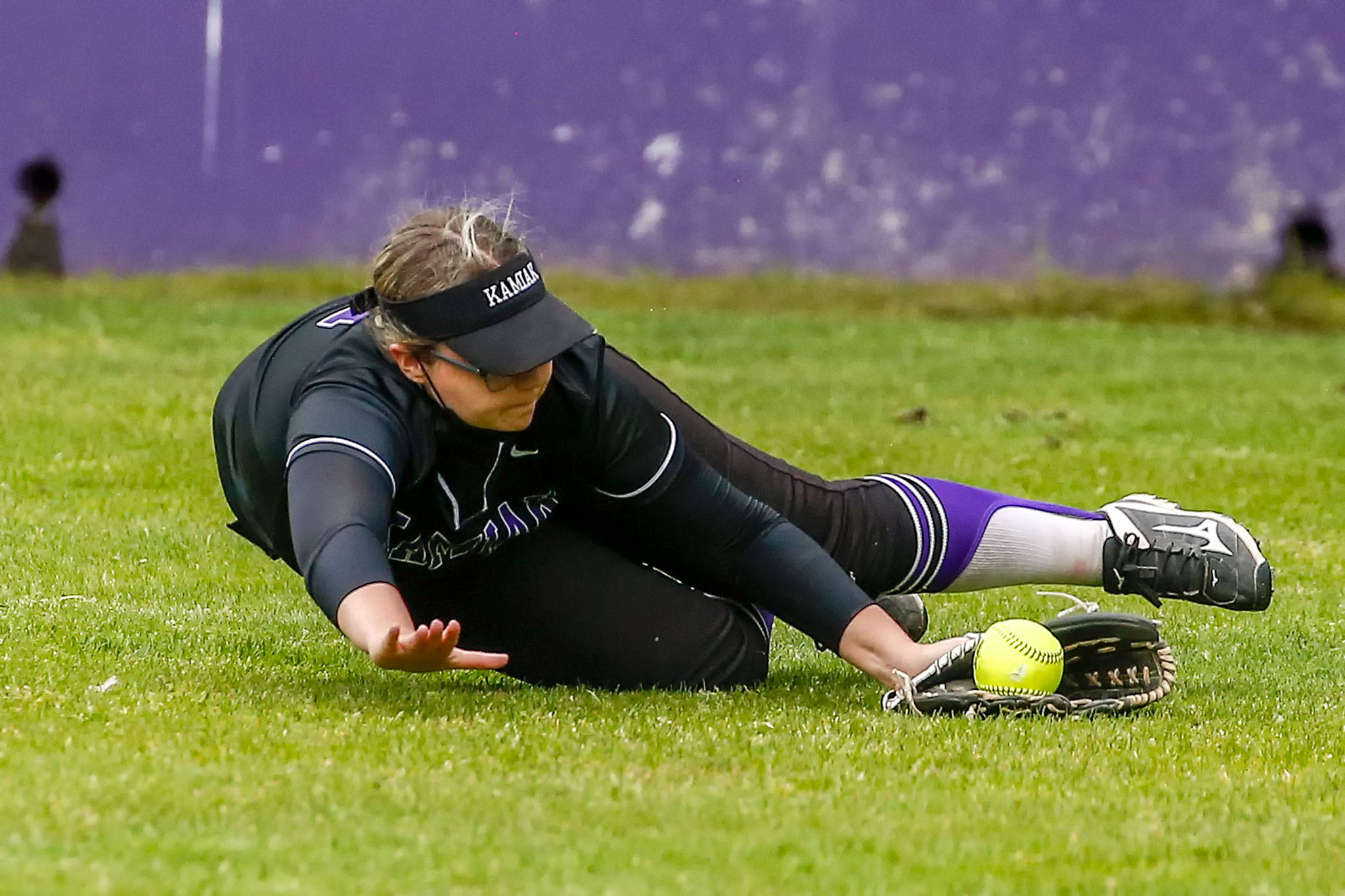 Kamiak’s Sara Schnurman makes a diving catch in the third inning of a game against Lakewood on Friday afternoon at Kamiak High School in Mukilteo. The Knights won 2-0. (Kevin Clark / The Herald)