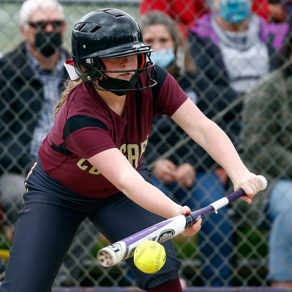 Lakewood’s Kaci Smith bunts during a game against Kamiak on Friday afternoon at Kamiak High School in Mukilteo. The Knights won 2-0. (Kevin Clark / The Herald)
