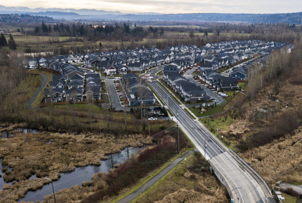 The Riverfront development sits just south of the remains of a former Everett landfill. New development will soon cover nearly all of the 70 acres. (Olivia Vanni / The Herald)
