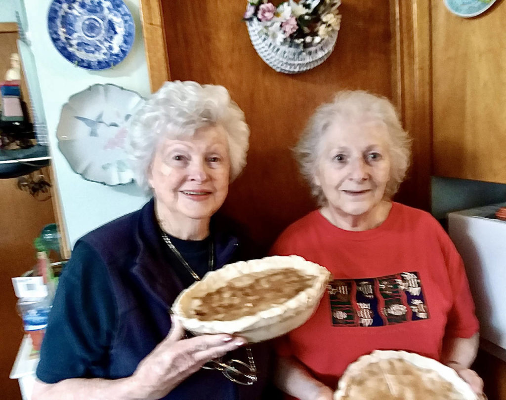 The pie bakers: Mary Peterson Clark (left) and Harriet Fugier. (Submitted photo)
