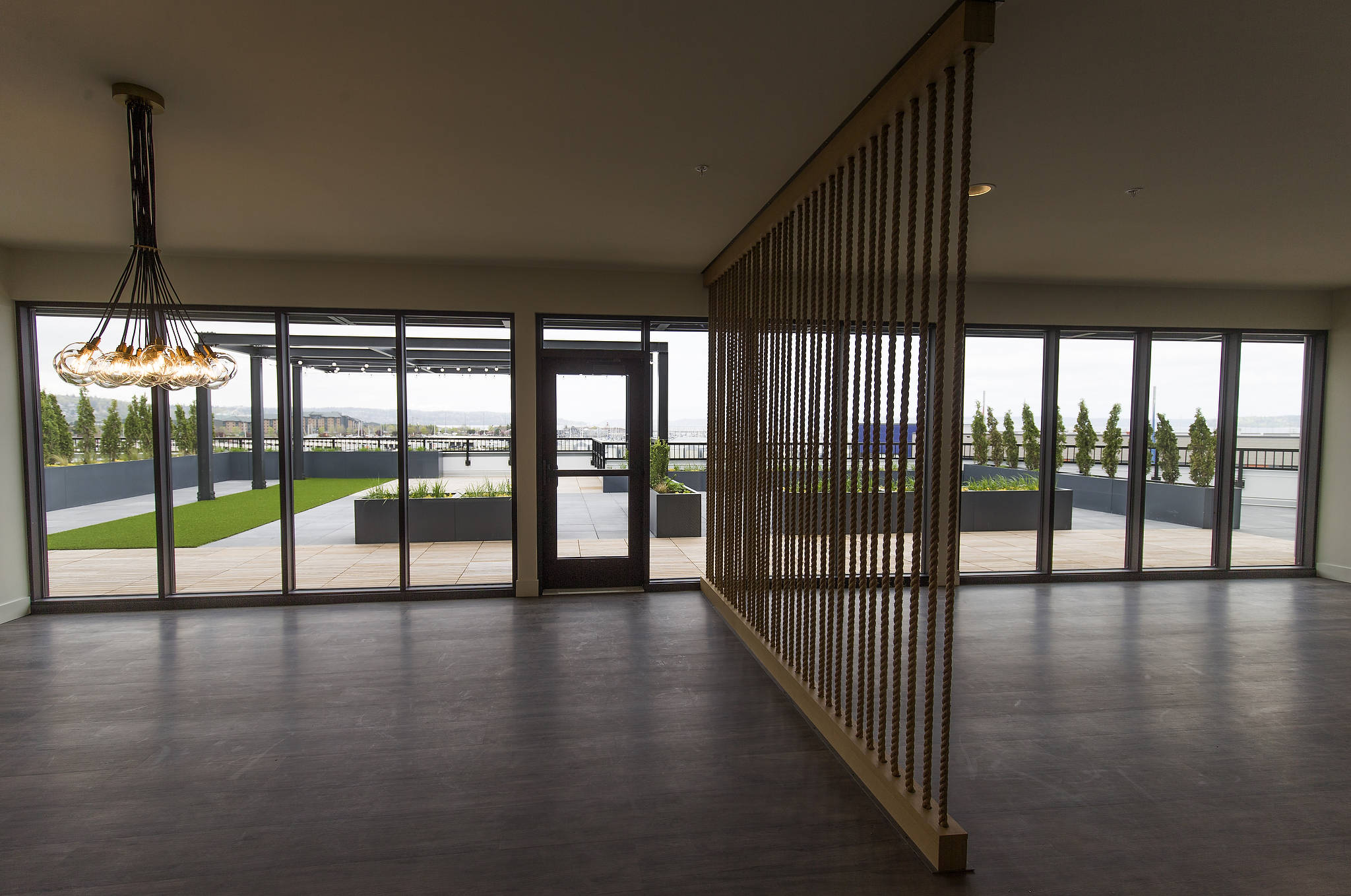 The view from the rooftop club room in the the north building of the Waterfront Place Apartments in Everett. (Andy Bronson / The Herald)