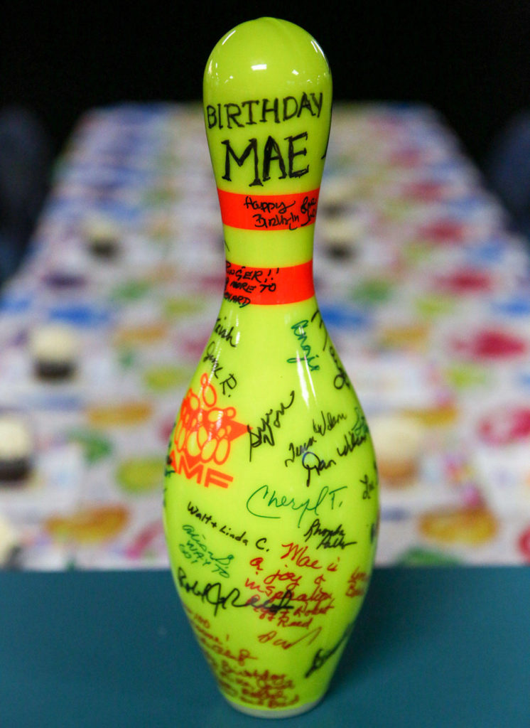A bowling pin was covered in signatures to celebrate Mae Tomita’s 100th birthday Wednesday afternoon at Strawberry Lanes in Marysville. (Kevin Clark / The Herald)
