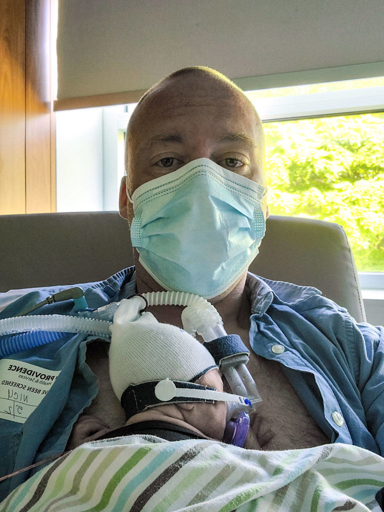 Matt Reed holds baby Dylan, who was delivered by C-section on April 15, three months premature. (Courtesy Photo)
