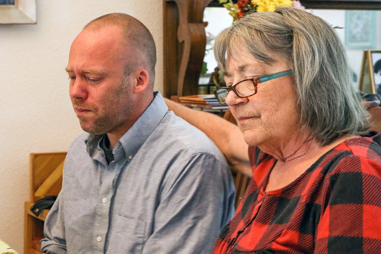 Matt Reed (left) with his mother-in-law, Karen Alvin, remembers the day Meredith Reed died leaving behind baby Dylan, born two months premature. Meredith died of an embolism in her lungs just after Dylan was delivered by C-section April 15.  (Kevin Clark / The Herald)