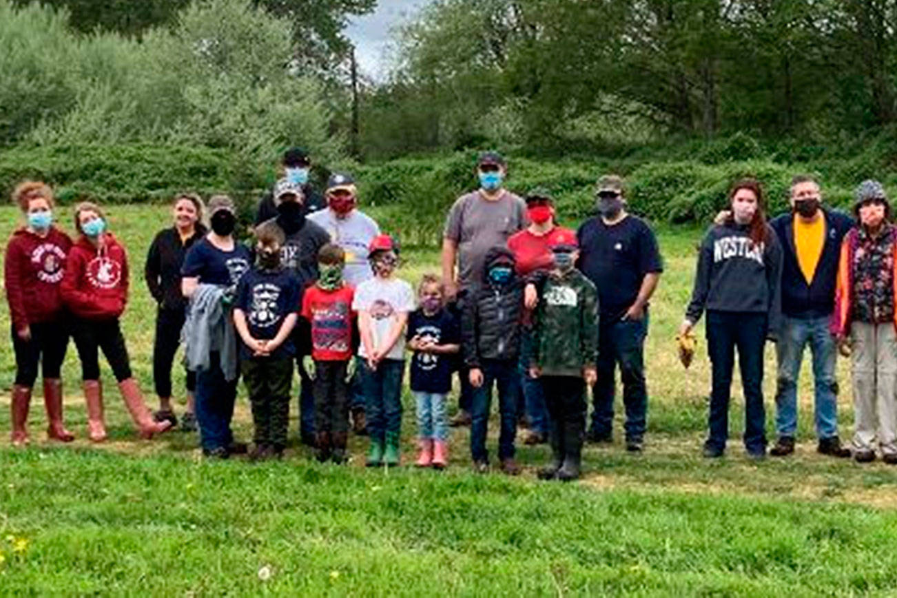 Volunteers from the Rotary Club of Arlington and local Cub Scouts planted trees at Stormwater Wetland Park on May 1. (City of Arlington)