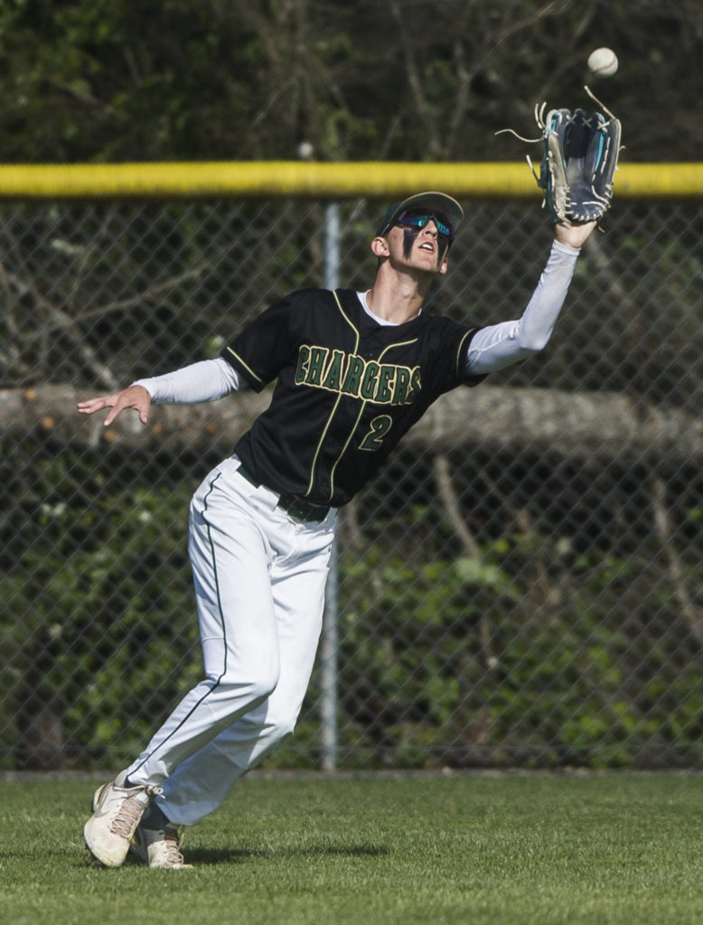 Marysville Getchell’s Keegan Agen makes a catch in the outfield during a game against Arlington on May 7, 2021, in Arlington. (Olivia Vanni / The Herald)
