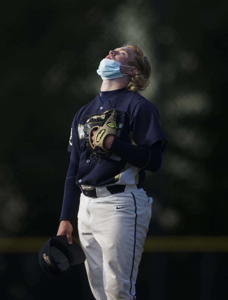 Arlington’s Jacob Burkett reacts on the mound during a game against Marysville Getchell on May 7, 2021, in Arlington. (Olivia Vanni / The Herald)
