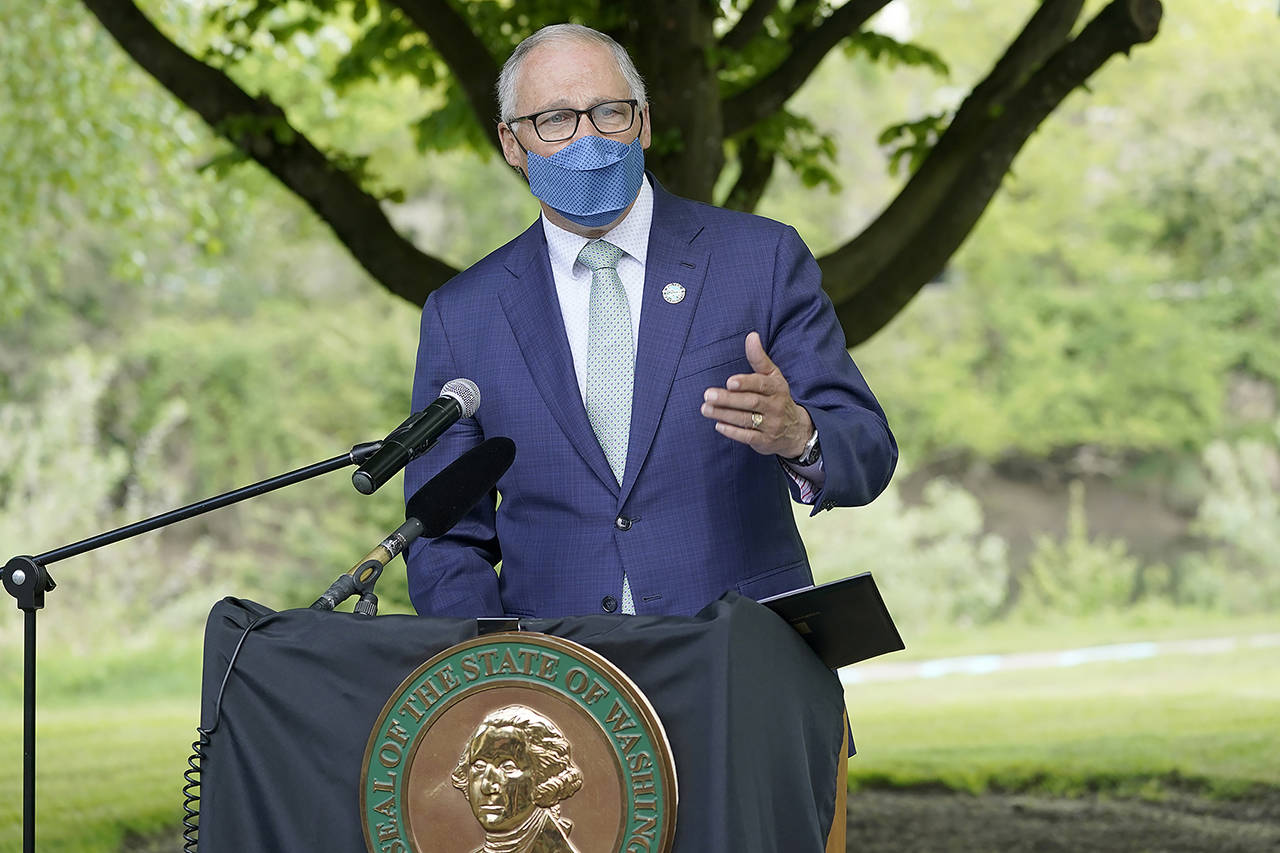 Gov. Jay Inslee signed House Bill 1386 on Monday. Here, he talks in Tukwila before last week’s signing of the new capital gains tax bill. (AP Photo/Ted S. Warren, file)
