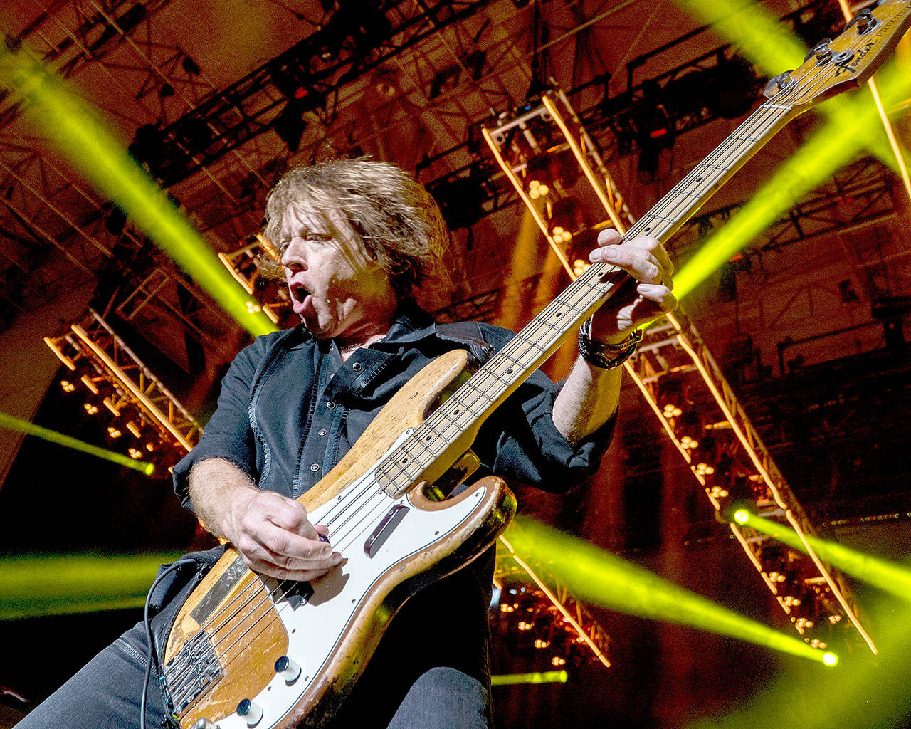 Bass player Jeff Pilson performs with Foreigner in 2018. The British-American rock band is scheduled to play in Everett in September. (Associated Press)