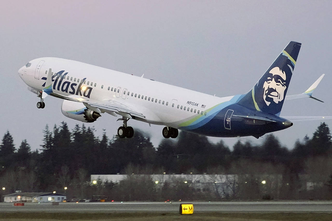 In this March 1 photo, The first Alaska Airlines passenger flight on a Boeing 737-9 Max airplane takes off on a flight to San Diego from Seattle-Tacoma International Airport in Seattle. (AP Photo/Ted S. Warren, File)