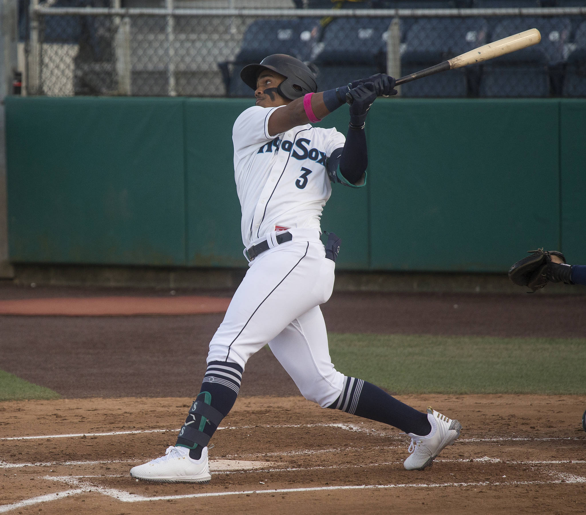 Aquasox’s Julio Rodriguez hits a two run homer as the Everett Aquasox beat the Tri-City Dust Devils in a home opening game at Funko Field on Tuesday, May 11, 2021 in Everett, Washington. (Andy Bronson / The Herald)