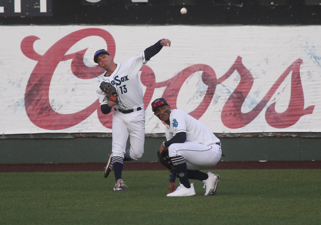 Aquasox’s Jack Larsen throws the ball over teammate Julio Rodriguez. The Everett Aquasox beat the Tri-City Dust Devils in a home opening game at Funko Field on Tuesday, May 11, 2021 in Everett, Washington. (Andy Bronson / The Herald)
