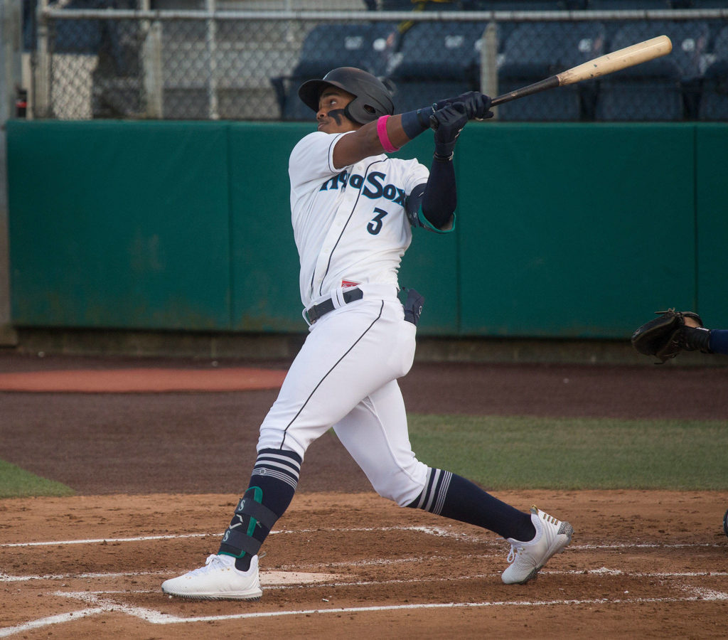 Aquasox’s Julio Rodriguez hits a two run homer as the Everett Aquasox beat the Tri-City Dust Devils in a home opening game at Funko Field on Tuesday, May 11, 2021 in Everett, Washington. (Andy Bronson / The Herald)