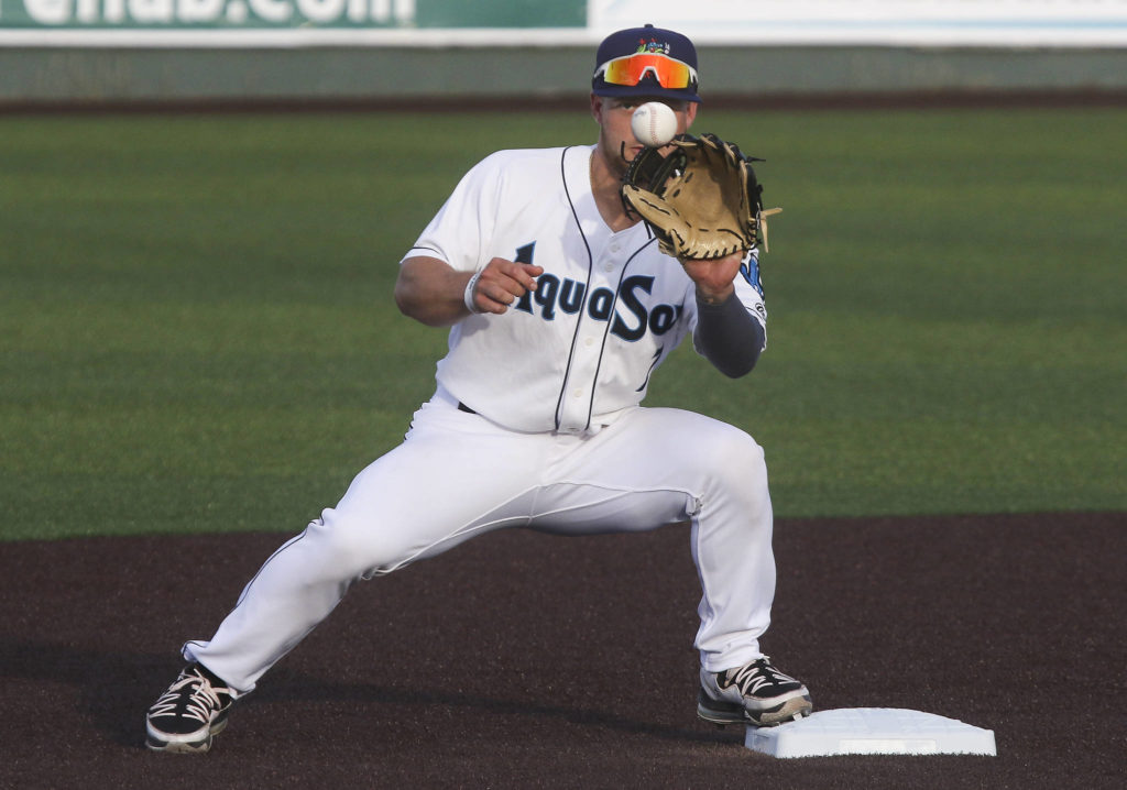 Aquasox’s Kaden Polcovich keeps an eye on the ball and makes a double play as the Everett Aquasox beat the Tri-City Dust Devils in a home opening game at Funko Field on Tuesday, May 11, 2021 in Everett, Washington. (Andy Bronson / The Herald)
