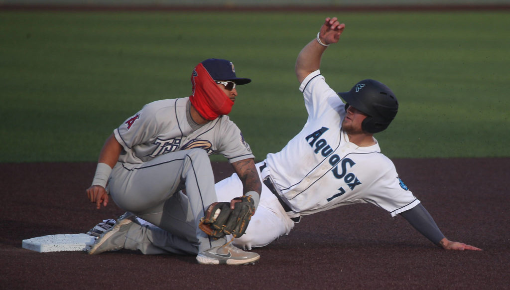Aquasox’s Kaden Polcovich beats the tag at second base as the Everett Aquasox beat the Tri-City Dust Devils in a home opening game at Funko Field on Tuesday, May 11, 2021 in Everett, Washington. (Andy Bronson / The Herald)
