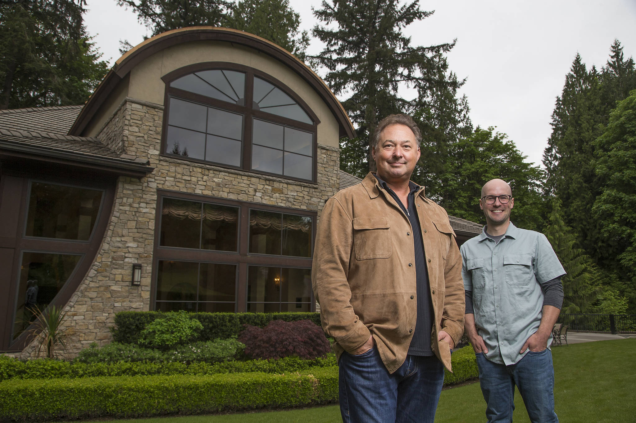 Paul Golitzin, president and director of winemaking, with winemaker Alex Stewart at Quilceda Creek Winery & Cellar on Monday, May 17, 2021 in Snohomish, Washington. (Andy Bronson / The Herald)