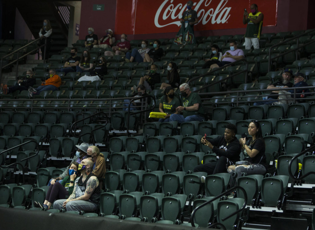 Fans sit socially distanced and masked in Angel of the Winds Arena for the Seattle Storm and Las Vegas Aces game on May 15, 2021, in Everett. 2,000 fans were allowed into the arena for the game. (Olivia Vanni / The Herald)
