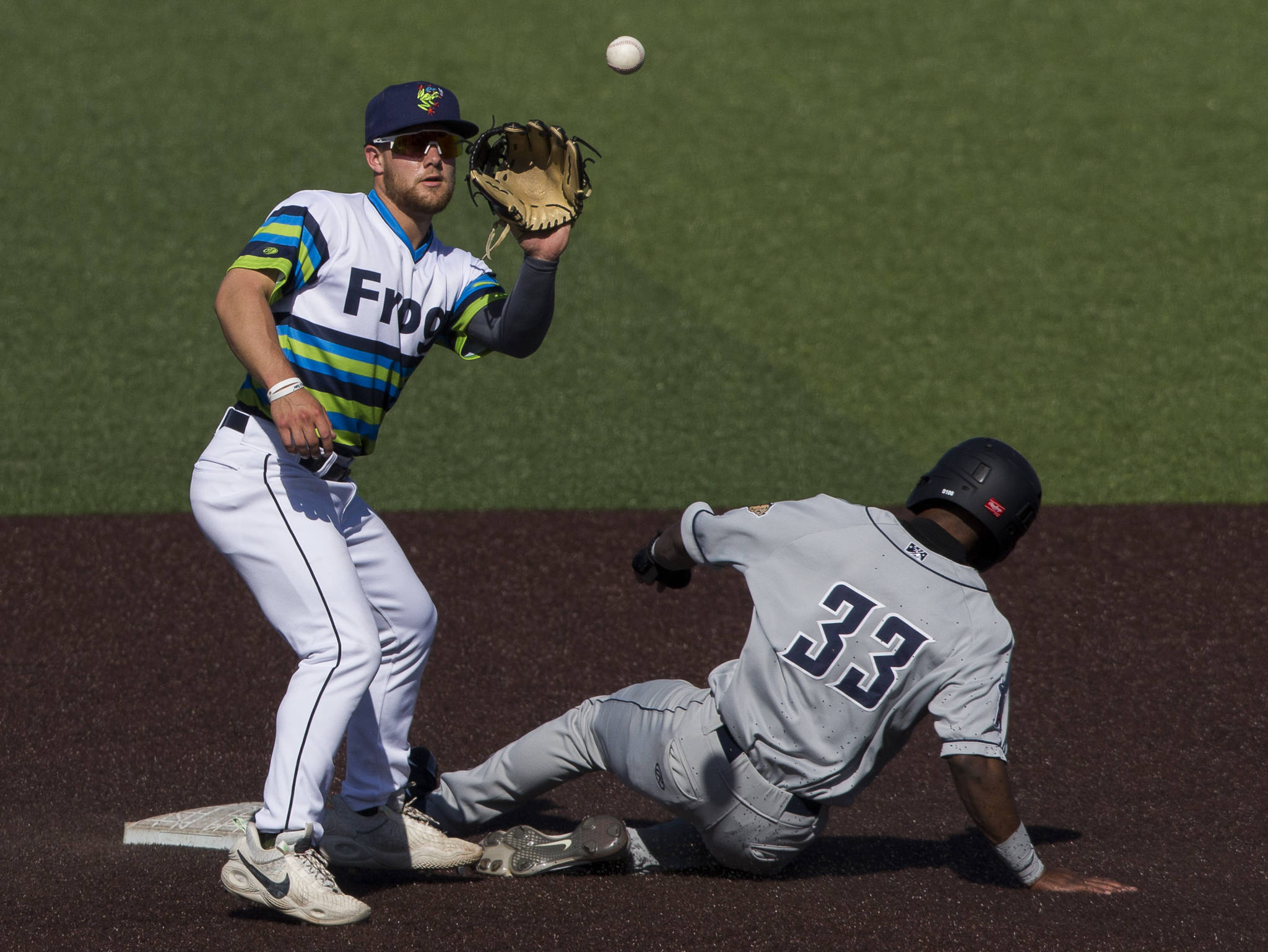 AquaSox’s Kaden Polcovich catches a throw a second base during the game against the Dust Devils on Sunday, May 16, 2021 in Everett, Wash.