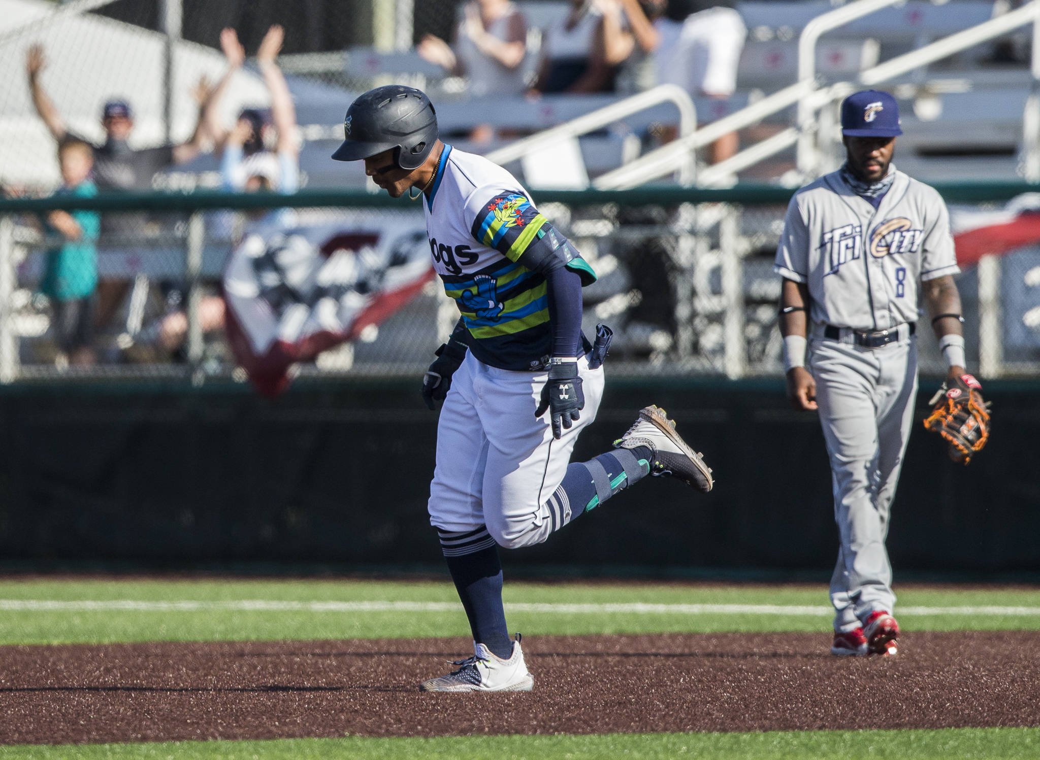 AquaSox phenom Julio Rodriguez celebrates while rounding the bases Sunday after blasting his fifth home run in six games. (Olivia Vanni / The Herald)