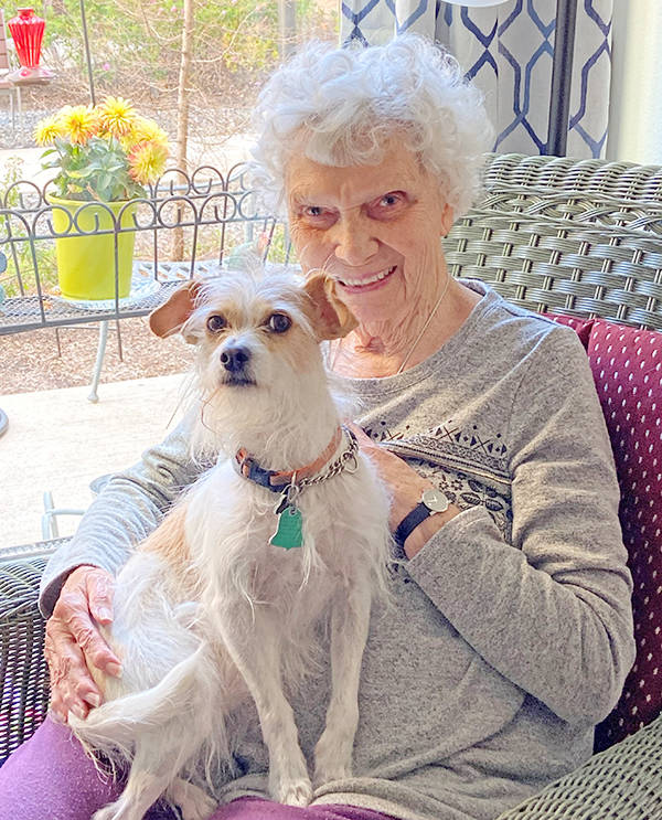 Quail Park of Lynnwood resident Pat Webster and her pup, Roxie. With its comfortable, lodge-like aesthetic, Quail Park offers a safe, comfortable, pet-friendly environment.