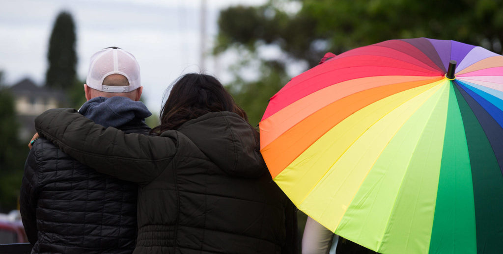 Pro-choice advocates stand in front of the Planned Parenthood building Wednesday in Everett. (Andy Bronson / The Herald)
