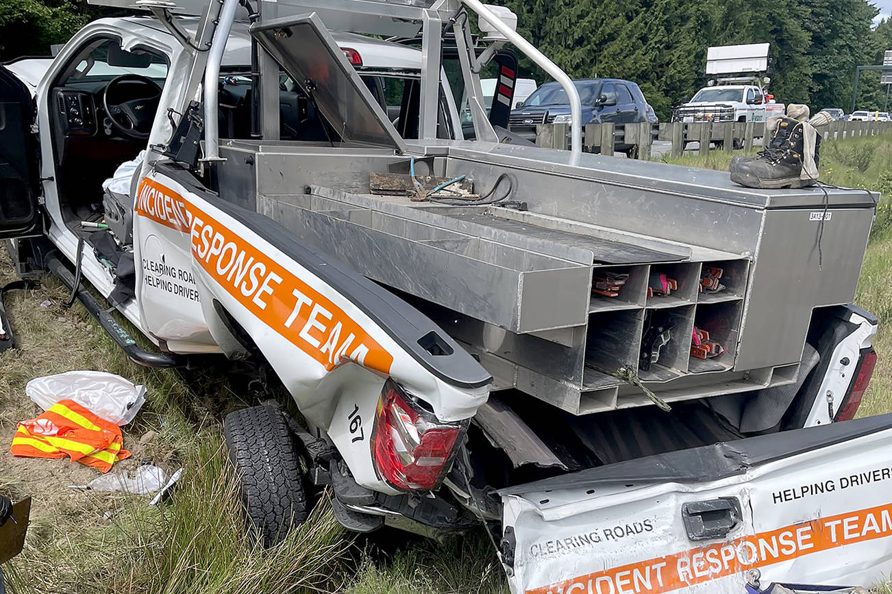 A suspected drugged driver crashed into a stopped state Department of Transportation truck Wednesday on I-405 east of Lynnwood, leaving a DOT worker with serious injuries, according to the Washington State Patrol. (Washington State Patrol)