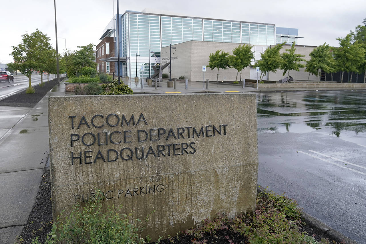 Three Tacoma police officers pleaded not guilty Friday in the death of Manuel Ellis. (AP Photo/Ted S. Warren)
