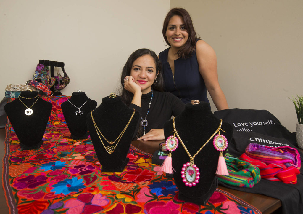 Suly Altamirano (left) and Patty Zavala, who opened an online clothing and jewelry store in Lynnwood. (Andy Bronson / The Herald)
