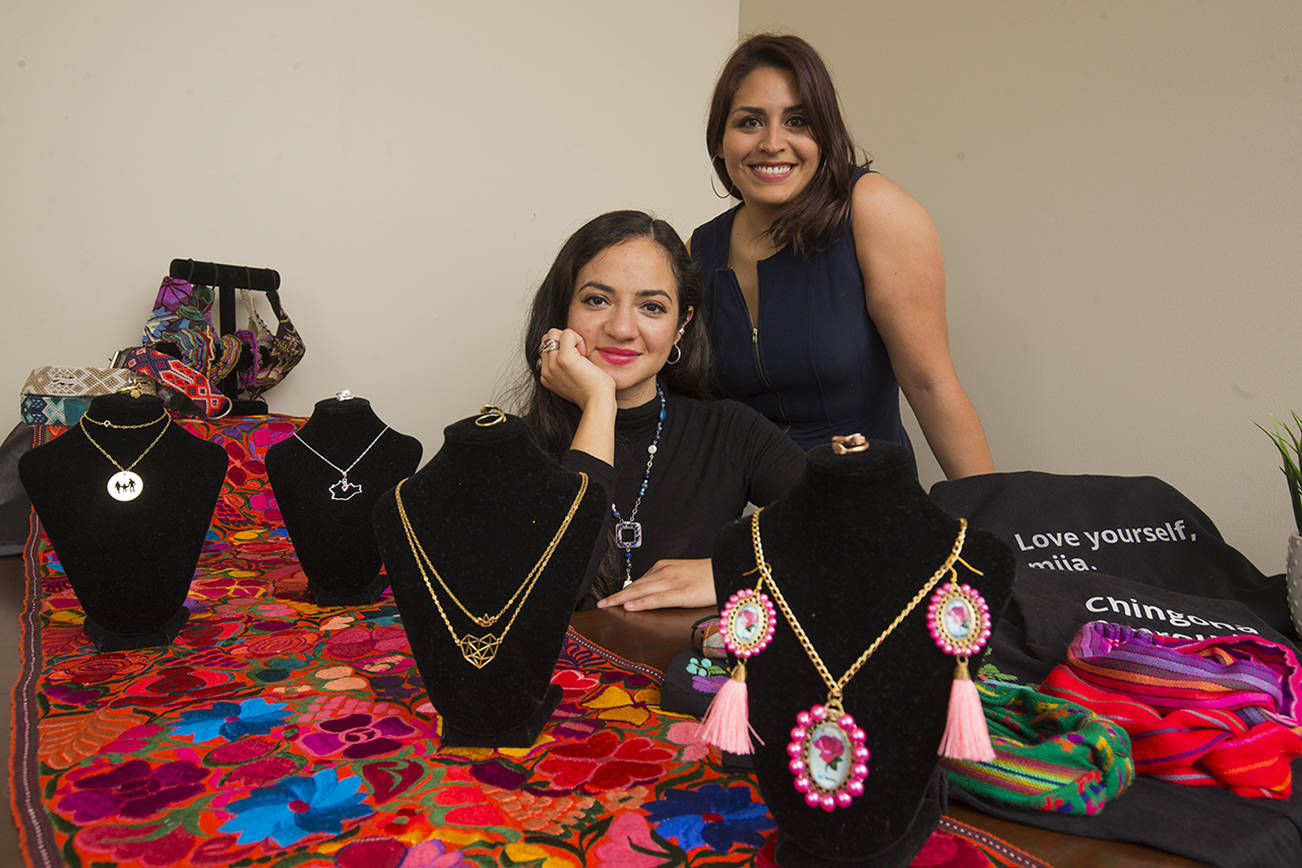 Connect Casino Road Connect pairs with Ventures, a Seattle-based nonprofit, to help low-income entrepreneurs launch a new business or boost an existing one.  Suly Altamirano a Mountlake Terrace resident, with Patty Zavala, standing, went through the six-week program, and has now opened an online clothing and jewelry store. Shot on Monday, May 24, 2021 in Lynnwood, Washington.  (Andy Bronson / The Herald)