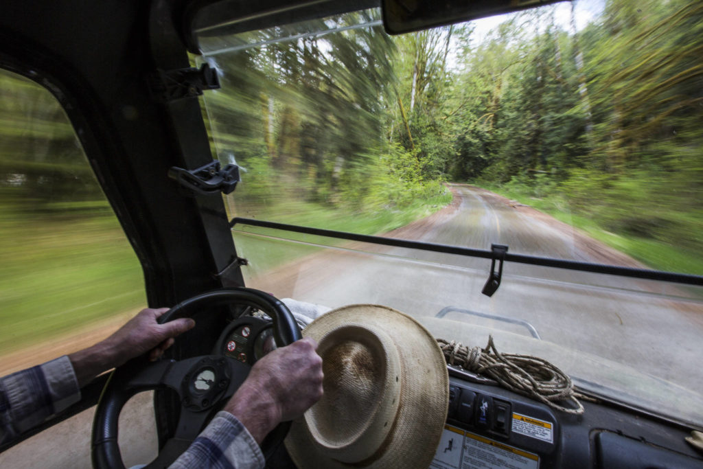 Bruce Kimball drives along an empty Index-Galena Road on May 9 in Index. (Olivia Vanni / The Herald)
