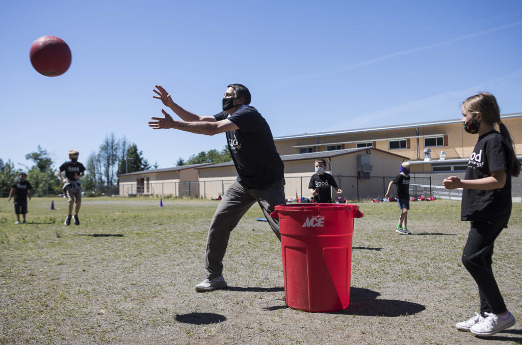 Jeff Thoreson plays kickball with his class. (Olivia Vanni / The Herald)
