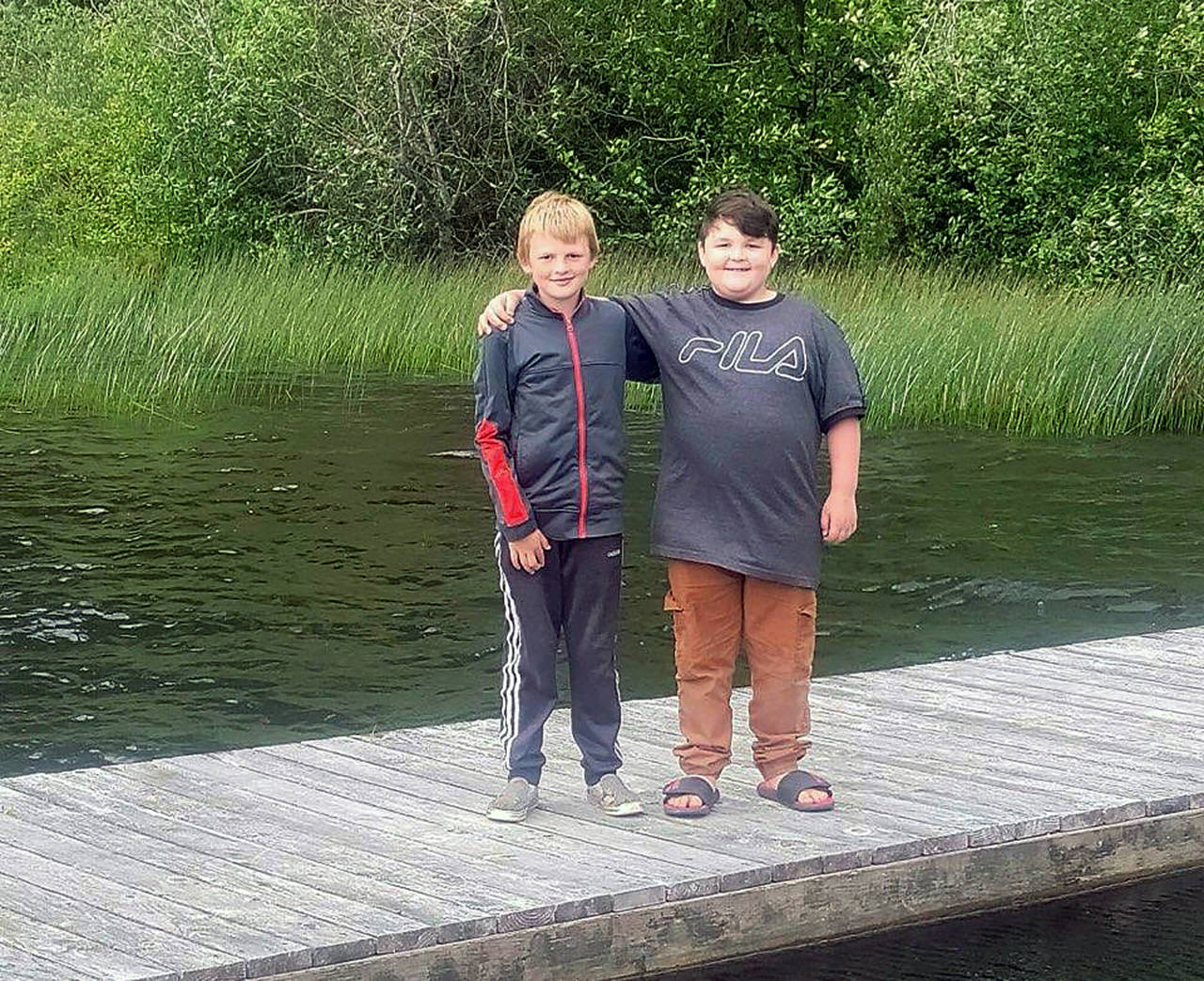 Mason Slattum (left) and his cousin Blake Ogden saved a 3-year-old from drowning in Deer Lake. (Contributed photo)