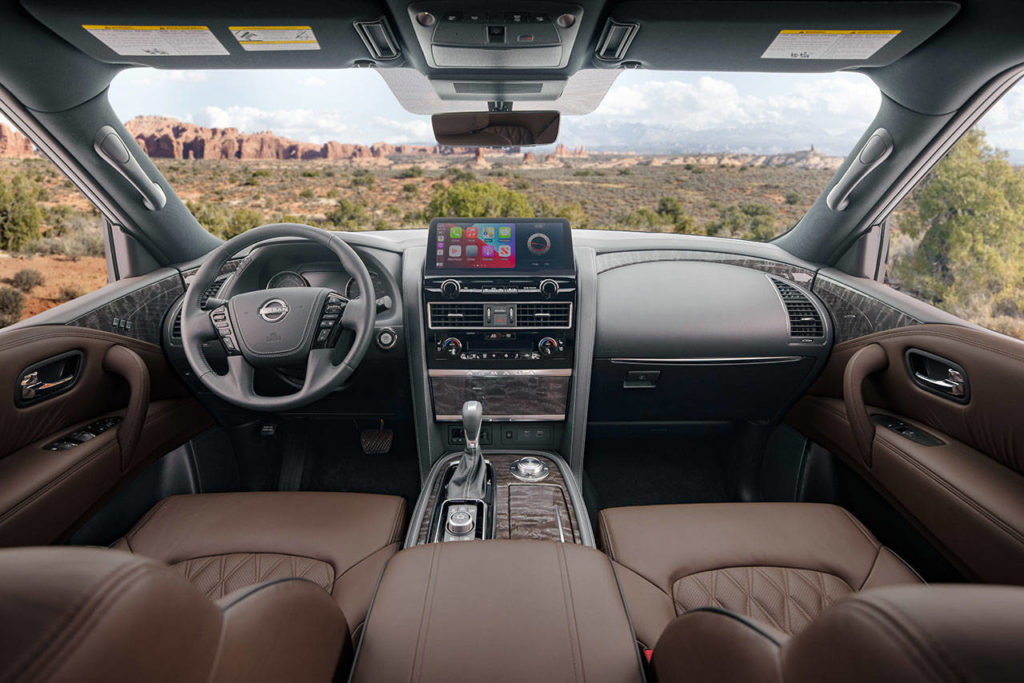 A new 12.3-inch infotainment display highlights the redesigned center stack inside the 2021 Nissan Armada. The Platinum interior is shown here. (Nissan) 

