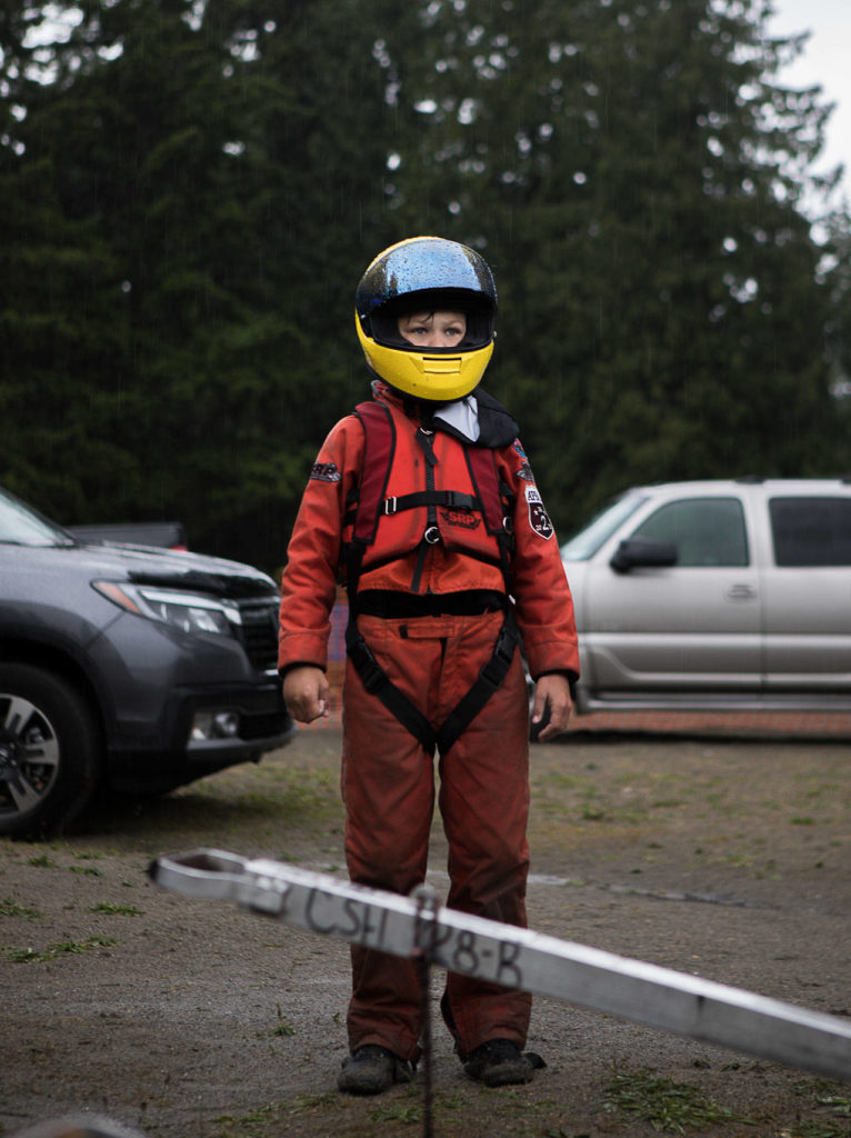 Carson Kelly watches as racers make their way into the pits on Saturday, June 5, 2021 in Everett, Wash. (Olivia Vanni / The Herald)
