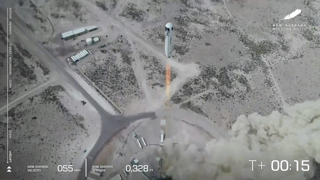 In this image from video, the New Shepard rocket lifts off during a test in West Texas on April 14. (Blue Origin via AP)
