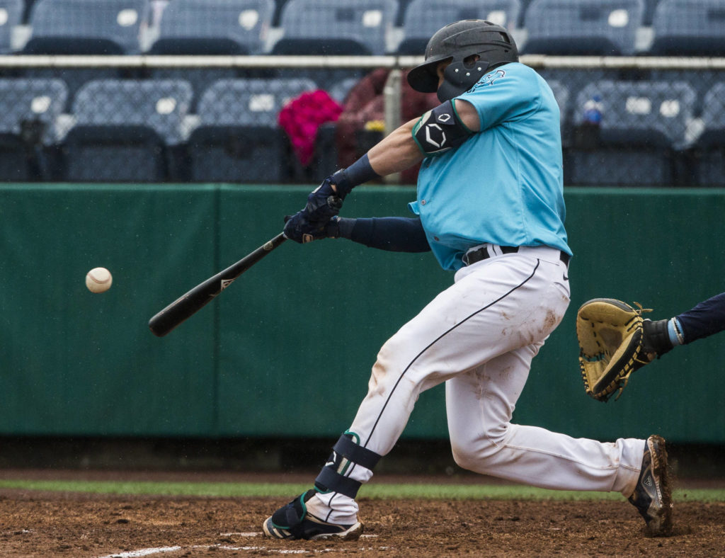 Carter Bins hits a home run during Sunday’s game. (Olivia Vanni / The Herald)
