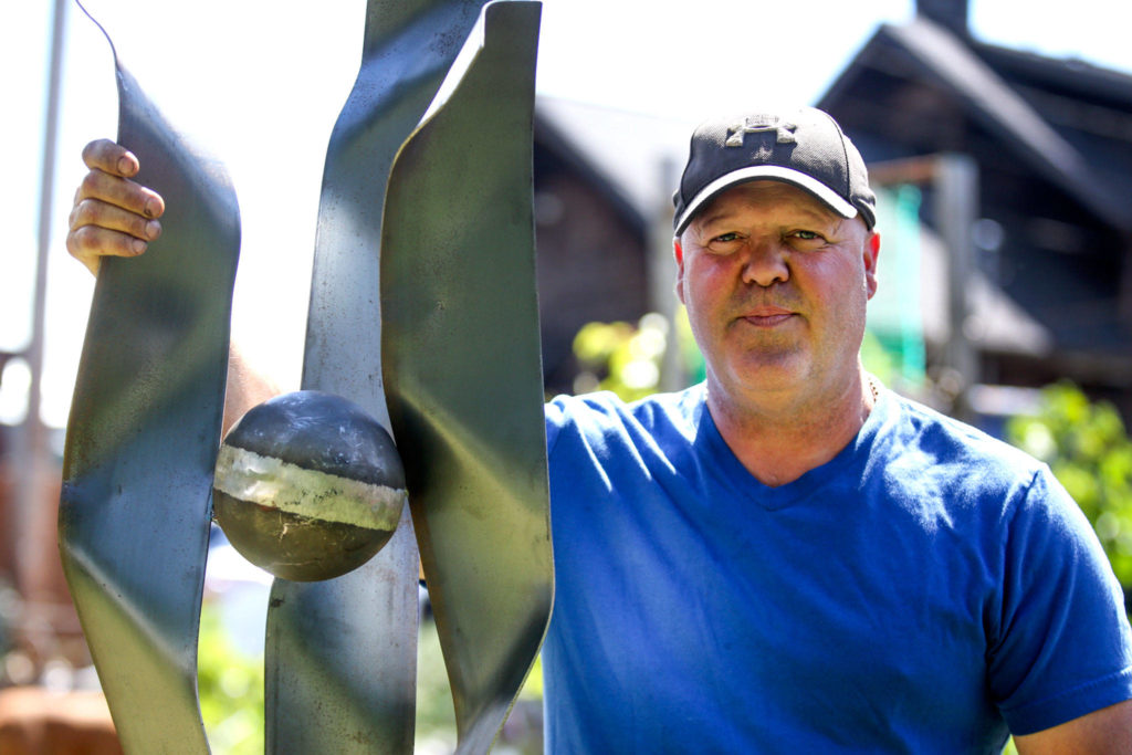 Metal artist Dennis Cant has had a booth at Sorticulture since the first event in 1997. (Kevin Clark / The Herald)
