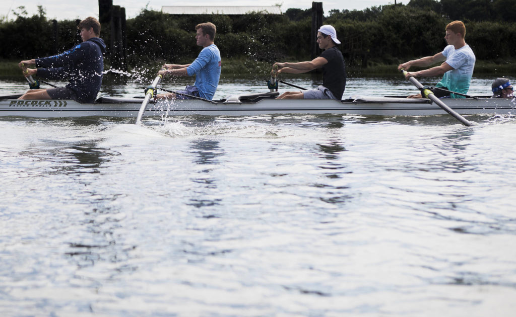 Everett Rowing’s men’s 4+ boat (from left, Jake Johansen, Adian Hayes, Dunn Sackett, Ivan Bury and Aidan Richer) practices on the Snohomish River in Everett. (Olivia Vanni / The Herald)
