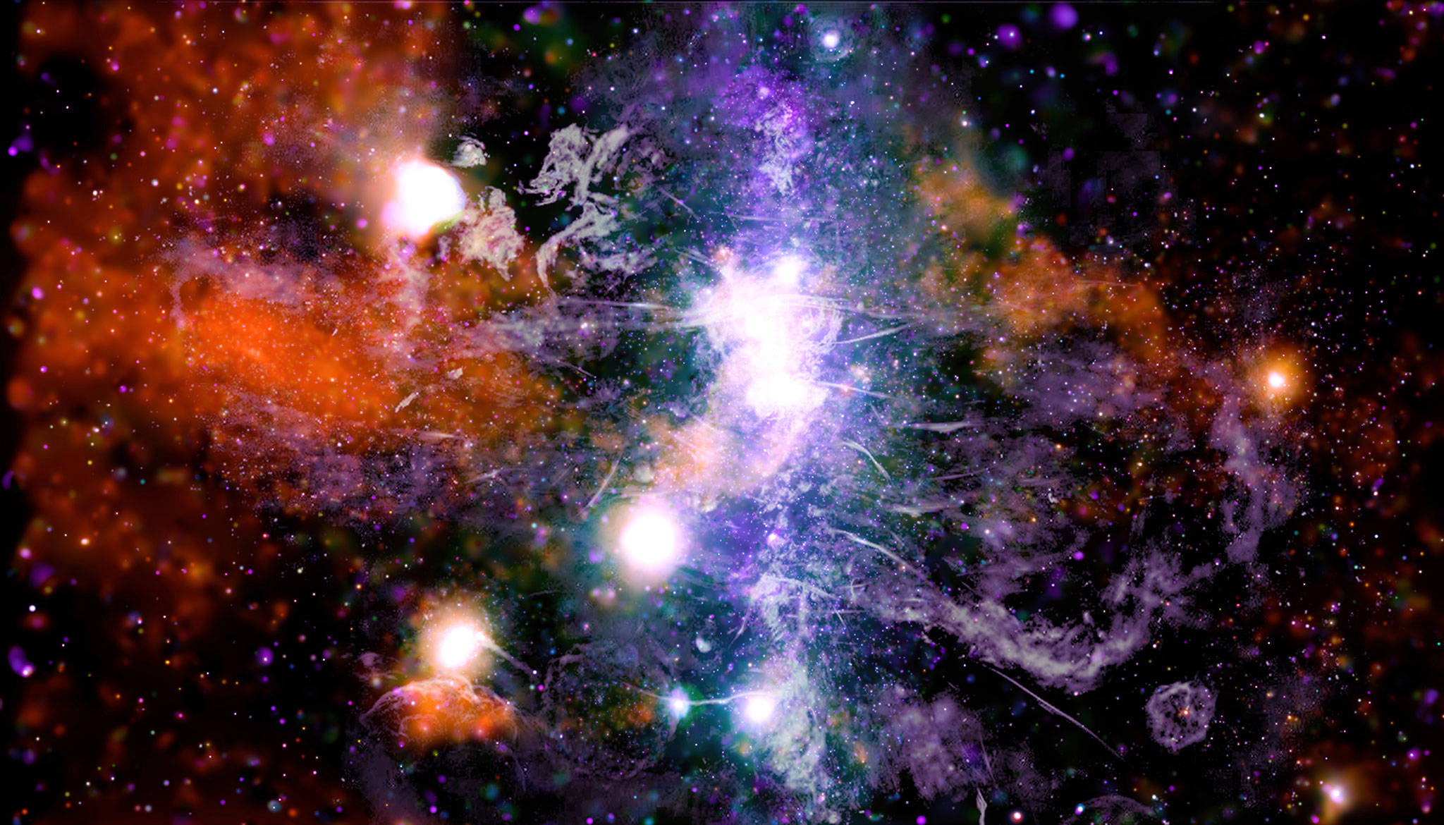 This false-color X-ray and radio frequency image made available by NASA on May 28, shows threads of superheated gas and magnetic fields at the center of the Milky Way galaxy. X-rays detected by the NASA’s Chandra X-ray Observatory are in orange, green, blue and purple, and radio data from the MeerKAT radio telescope in South Africa are shown in lilac and gray. Astronomer Daniel Wang of the University of Massachusetts Amherst said Friday he spent a year working on this, while stuck at home during the pandemic. (NASA via AP)