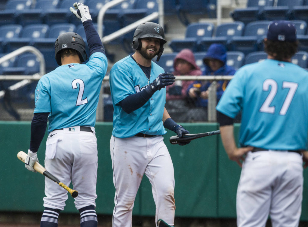 Carter Bins (center) leads the High-A West in slugging percentage. (Olivia Vanni / The Herald)
