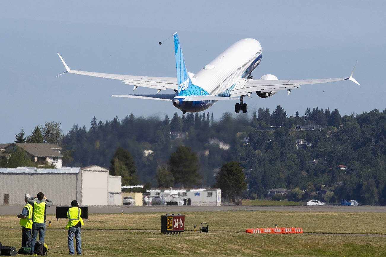 The final version of the 737 MAX, the MAX 10, takes off from Renton Airport in Renton, WA on its first flight Friday, June 18, 2021. The plane will fly over Eastern Washington and then land at Boeing Field  (Ellen M. Banner/The Seattle Times via AP, Pool)