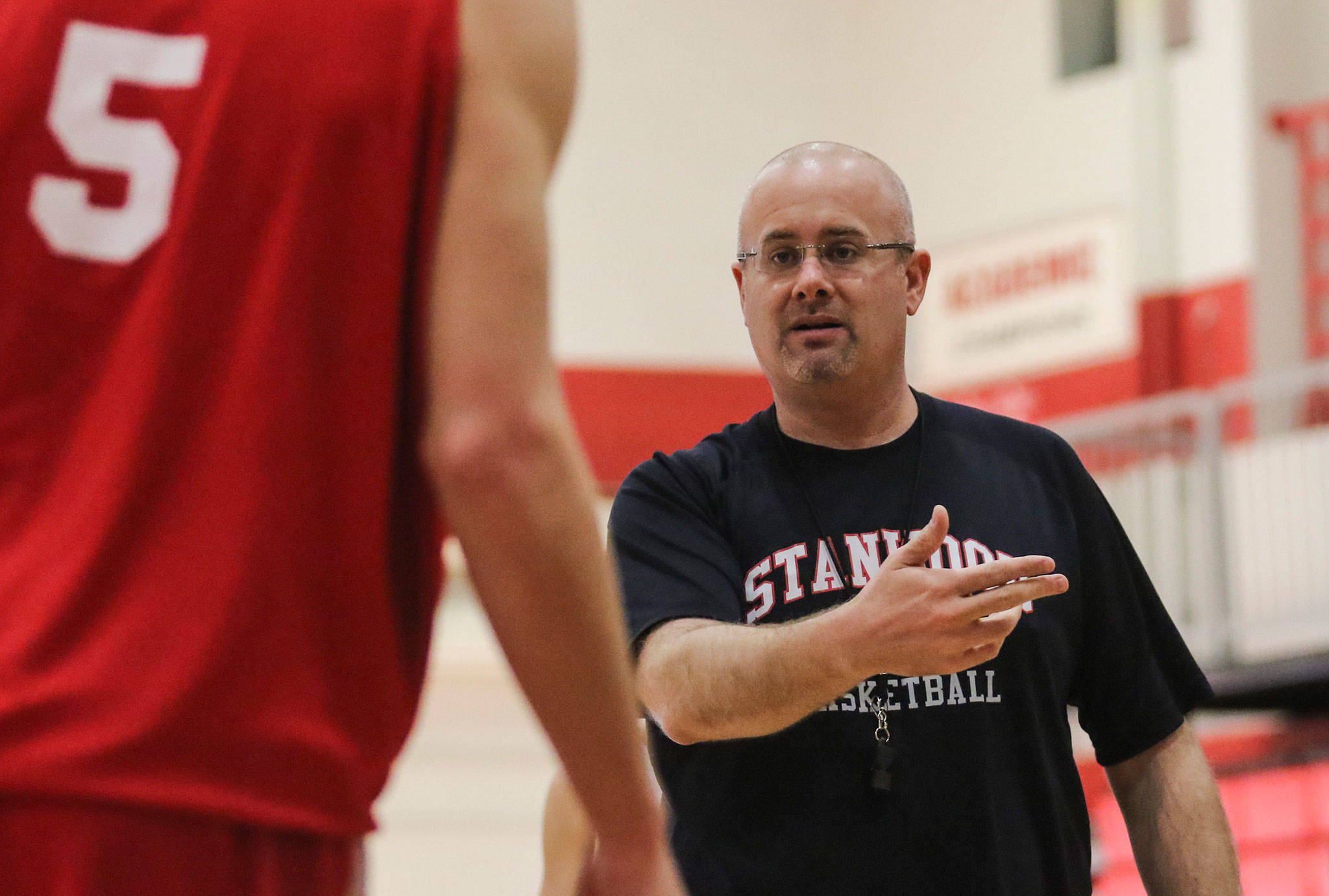 Zach Ward compiled a 226-102 career record as the Stanwood boys basketball coach over the past 14 seasons. (Kevin Clark / The Herald)